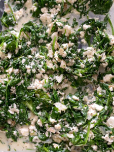 This Baked Spinach and Feta Pasta is a warm and creamy take on classic Greek Spanakopita. It's made with fresh baby spinach, a block of feta cheese, and many other delicious flavors!